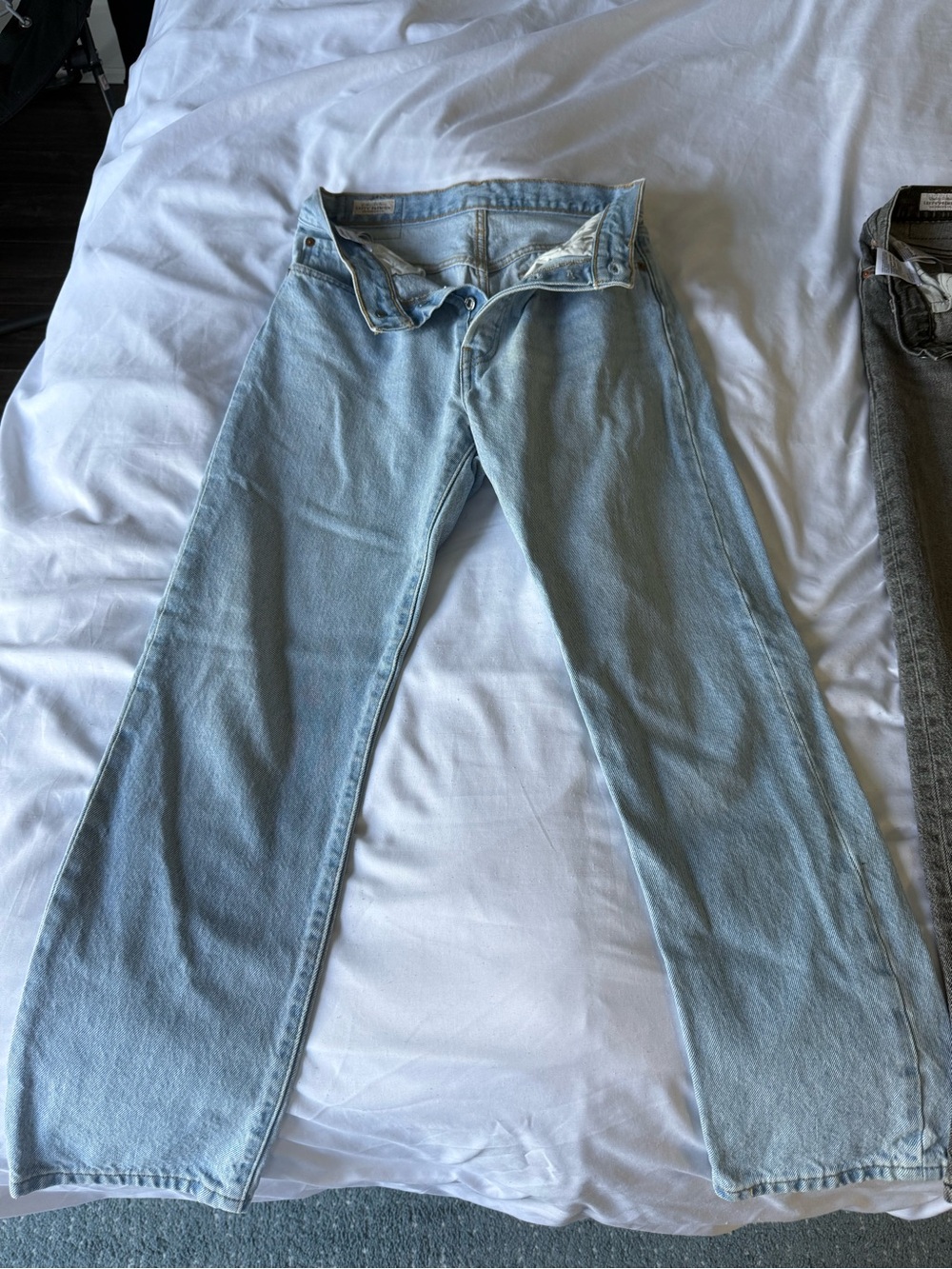 2 pairs of LEVIS JEANS